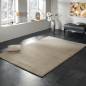 Preview: Langflorteppich in beige von Heineking24 auf schwarzem Boden in modernem Raum